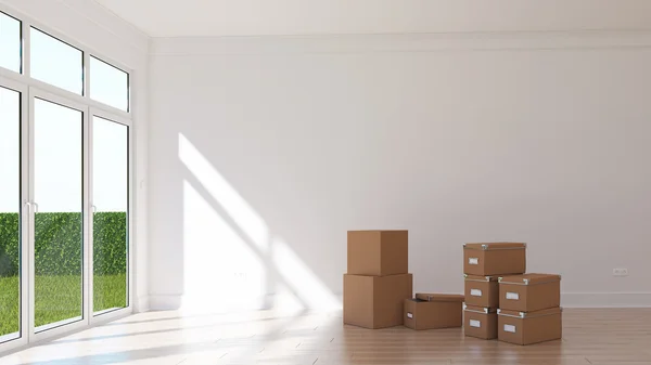 Habitación soleada vacía con cajas de cartón — Foto de Stock