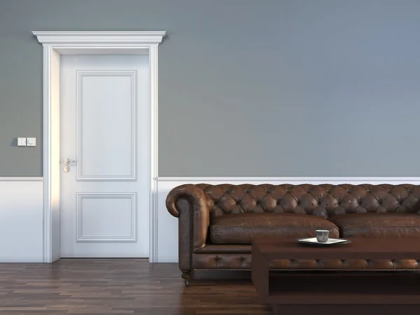 Door with sofa in empty room — Stock Photo, Image