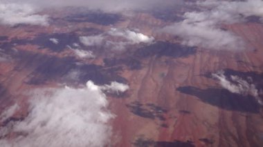 AERIAL: Spectacular view from an aeroplane of clouds and Great Victoria Desert.