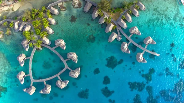 TOP DOWN Spectacular drone shot of exotic island landscape and rich hotel resort — Stok fotoğraf