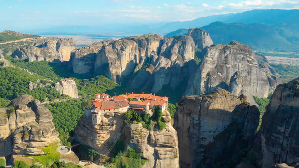 DRONE: Flying high above an Orthodox temple complex built on top of cliffs.