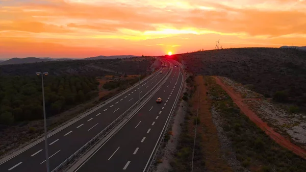 AERIAL: Flying above cars speeding up and down the new highway built in Croatia. — Stock Photo, Image