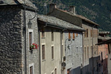 CLOSE UP: Spring sunshine illuminates the historic stone buildings in France.