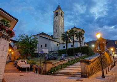 Beautiful view of an ancient church in a quiet village on cloudy summer morning.