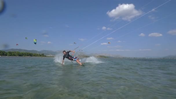 Kiteboarder having fun kiting — Stock Video