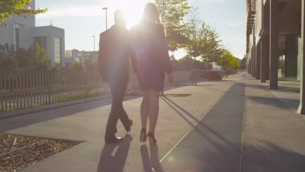 Businessman and businesswoman going to work — Stock Video