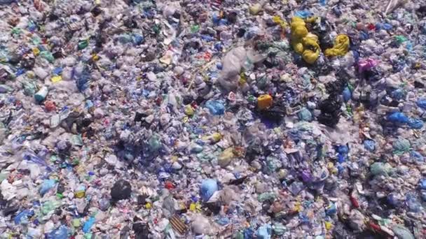 AERIAL: Endless pile of plastic bottles, bags and other waste — Stock Video