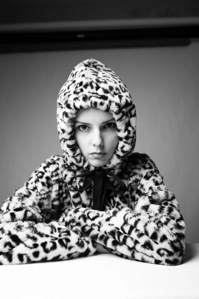 woman in leopard print, black and white art portrait