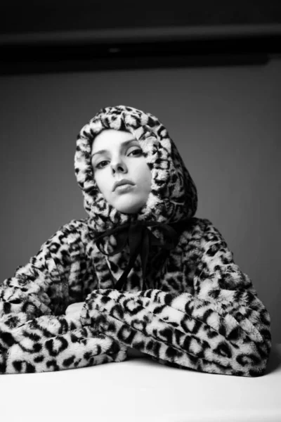 woman in leopard print, black and white art portrait
