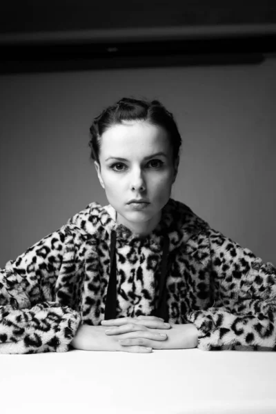 woman in leopard print, black and white art portrait