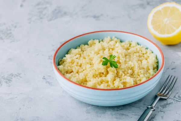 Cooked Couscous Blue Ceramic Bowl Table Selective Focus Copy Space — Stock Photo, Image