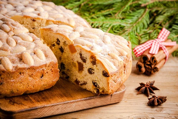 Dundee cake on a wooden table — Stock Photo, Image