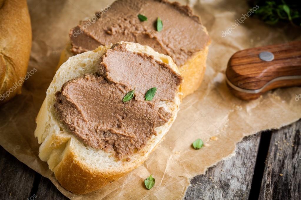 Sandwiches with homemade chicken liver pate closeup Stock Photo by