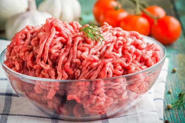 Fresh raw minced beef in a bowl — Stock Photo, Image