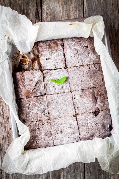 Brownie dessert in the form of a wooden table — ストック写真