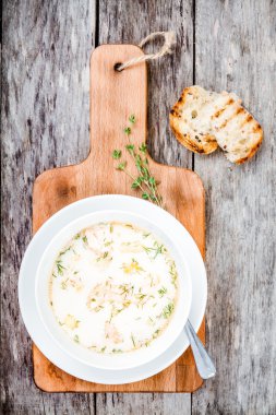 homemade soup with salmon and cream clipart