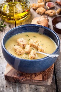 homemade zucchini cream soup with croutons clipart