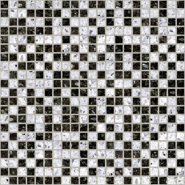 Mosaic in white and black marble. Element for interior design. Ceramic tile