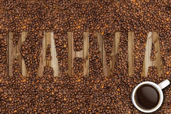 coffee lettering with grains seed beans in different languages finnish