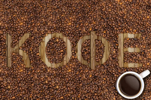 coffee lettering with grains seed beans in different languages russian