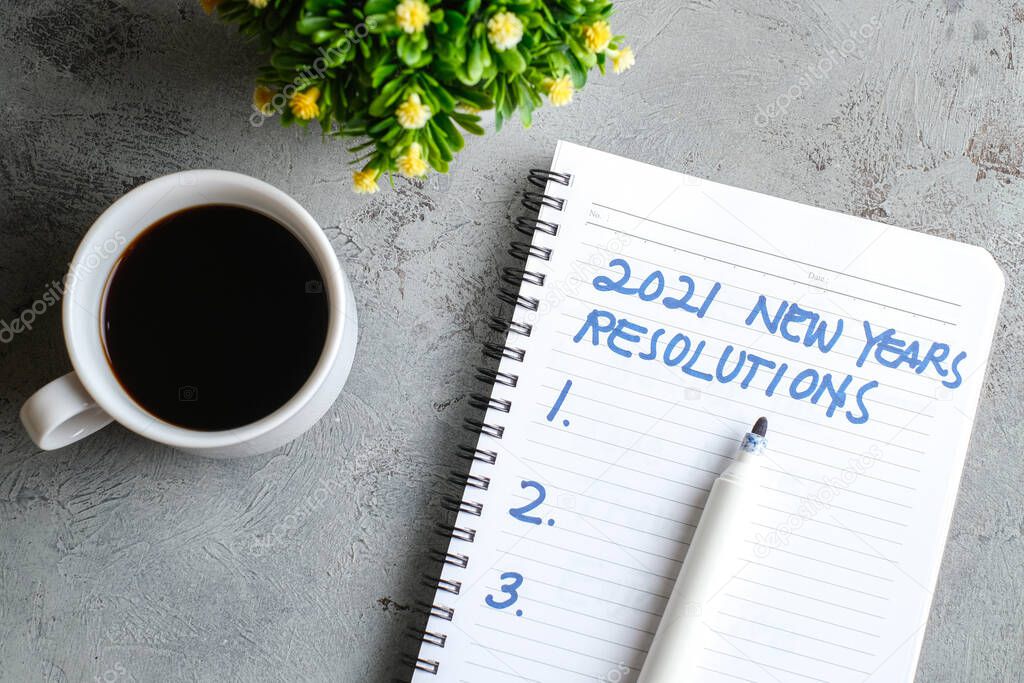 2021 resolutions, goals plans in life, business, close up of man writing and preparing for new year 2021