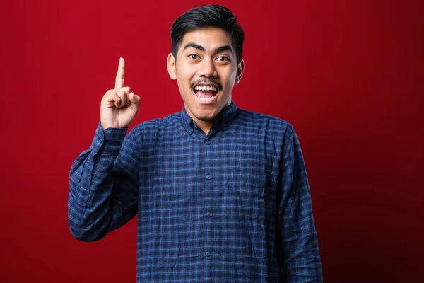 Young Handsome Man Wearing Casual Shirt Red Background Pointing Finger — Stockfoto