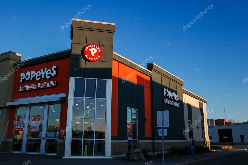 Ottawa, Ontario, Canada - November 18, 2020: A Popeyes Louisiana Kitchen restaurant in the College Square shopping center.