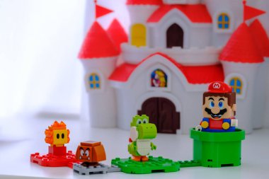Ottawa, Ontario, Canada - January 7, 2021: Collectible figures from the LEGO Super Mario series of building toys. clipart