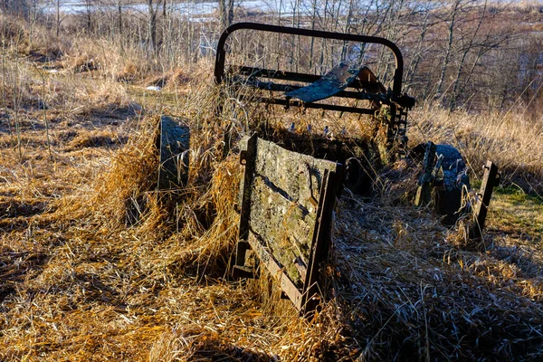 Derelict Old Manure Spreader Sits Broken Covered Dried Grass Lichen — Stock Photo, Image