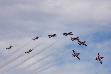 Ottawa, Ontario, Canada - July 1, 2021: The Canadian Forces' 431 Air Demonstration Squadron, better known as the 'Snowbirds', flies in formation over Ottawa on Canada Day. clipart