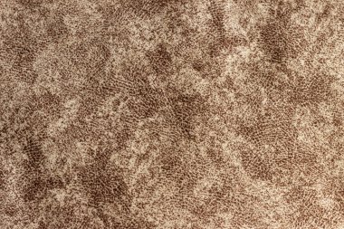 Koyu kahverengi, yoğun bir kumaşın farklı bir deseni var..