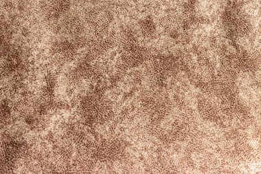 Koyu kahverengi, yoğun bir kumaşın farklı bir deseni var..