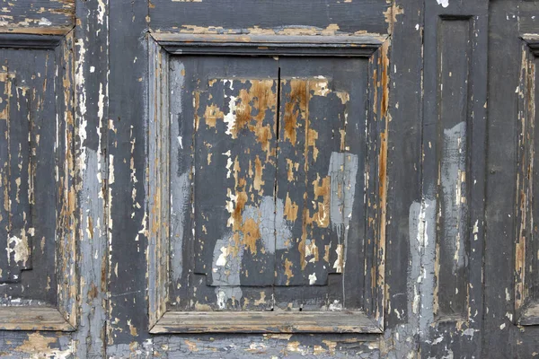 剥離と風化塗料と古い木の板の表面 — ストック写真