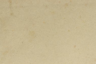 Eskimiş eski kartonun yüzeyi lekelenmiş..