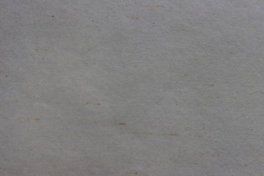 Lekeli ve lifli pürüzlü gri kağıdın dokusu.