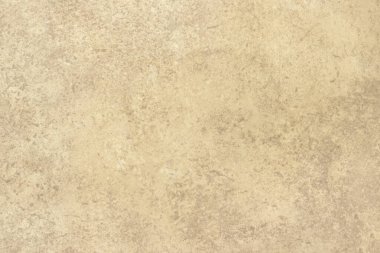 Sarı döşeme kiremitlerinin deseni mermer taklidiyle. 