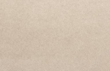 Yoğun ışıklı bir karton kağıdın tekdüze dokusu.