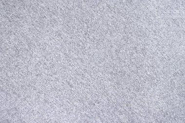 Açık gri benekli kumaş ve küçük lekeler. Üniforma nötr gri doku.