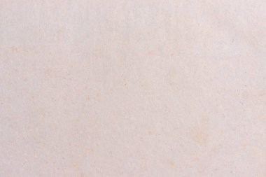 Eski, lekeli, sarı bir kağıt. Nötr ışık dokusu.