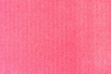 Bir sayfa kırmızı renkli kağıt. Sert pürüzsüz doku.