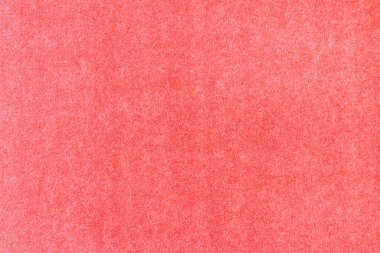Bir sayfa kırmızı renkli kağıt. Sert pürüzsüz doku.