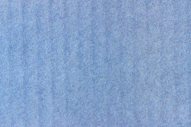 Bir sayfa mavi renkli kağıt. Sert pürüzsüz doku.