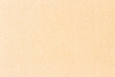 Düz bir karton çarşafın yüzeyi. Üniforma açık kahverengi doku.