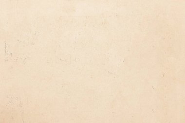 Lekelerle kaplı eski sarı kağıt. Çatlak ve dikişli kağıt dokusu.