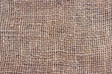 Büyük hücreli doğal çuval bezi. Kabaca örülmüş kumaş dokusu ağ ve liflerle.