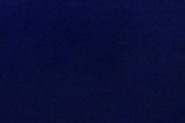 Lekeli, siyah üniformasız kâğıt. Lifli ve noktalı kağıt dokusu.