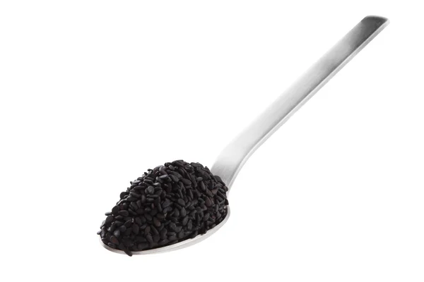 Black sesame in spoon — Stock Photo, Image