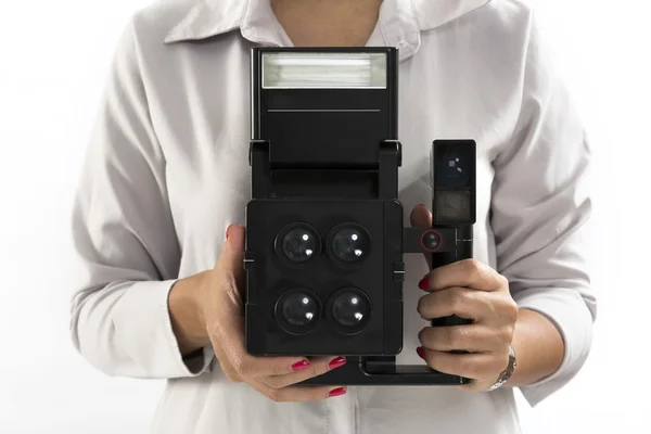 Ruka držící vintage instantní fotoaparát — Stock fotografie