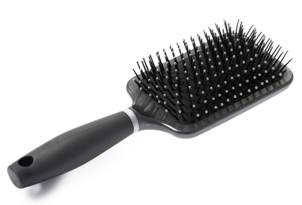Black hairbrush on white