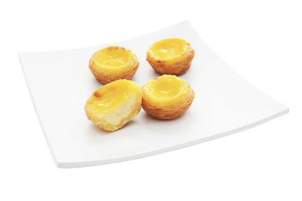 Egg tart on plate isolated on white — Stock Photo, Image